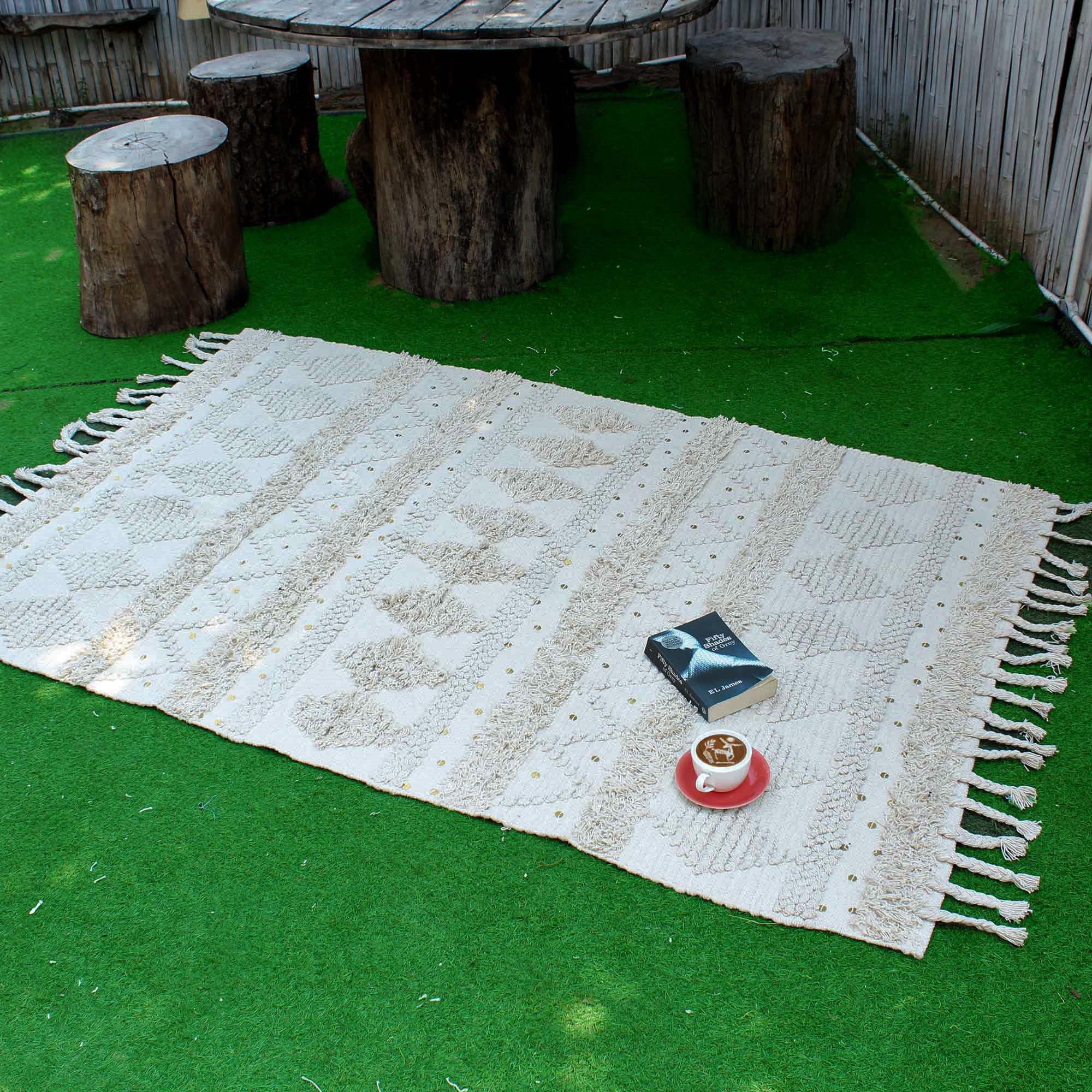 Off-White and Cream Textured Area Rug with Fringe and Sequins
